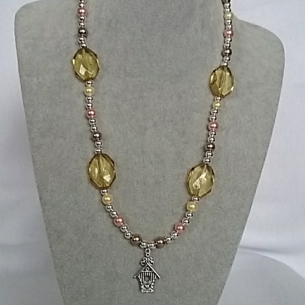 Womens birdhouse charm neutral colors beaded necklace